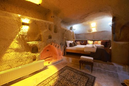 Ένα ή περισσότερα κρεβάτια σε δωμάτιο στο Mommy's Cave Home