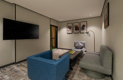 Ross Hotelにあるテレビまたはエンターテインメントセンター