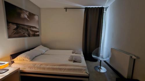 Postel nebo postele na pokoji v ubytování Apartment Zaralux