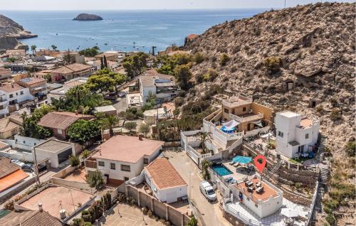 una vista aérea de una ciudad con el océano en Lovely Home In San Juan De Los Terreros, en San Juan de los Terreros