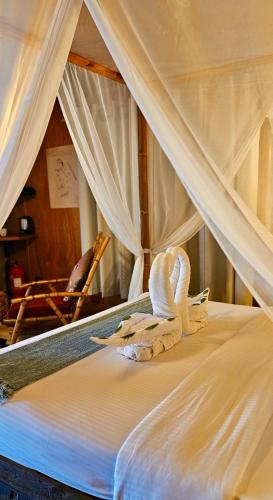 Postel nebo postele na pokoji v ubytování Souly Ecolodge Salalah