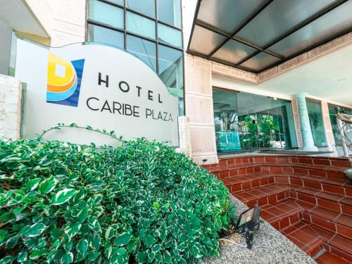 a sign in front of a hotel cardiac plaza at Hotel Caribe Plaza Barranquilla in Barranquilla
