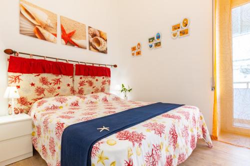 Posteľ alebo postele v izbe v ubytovaní Appartamento Onda Bilo - MyHo Casa