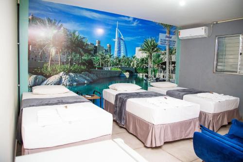 Katil atau katil-katil dalam bilik di Shelter Hostel e Pousada
