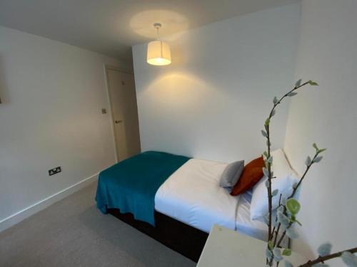 Letto o letti in una camera di Central Townhouse & Terrace