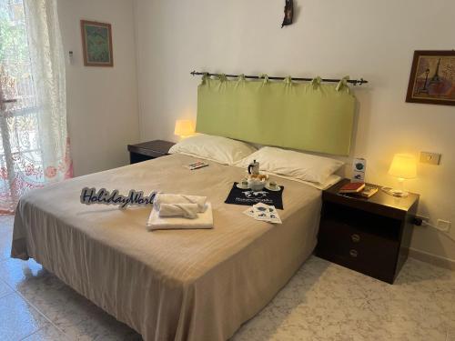 Postel nebo postele na pokoji v ubytování La Baia Di Tindari by Holiday World