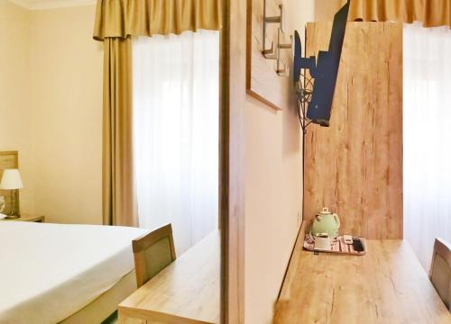 Postel nebo postele na pokoji v ubytování Guesthouse Central Station Group - Via Ponte Seveso 18