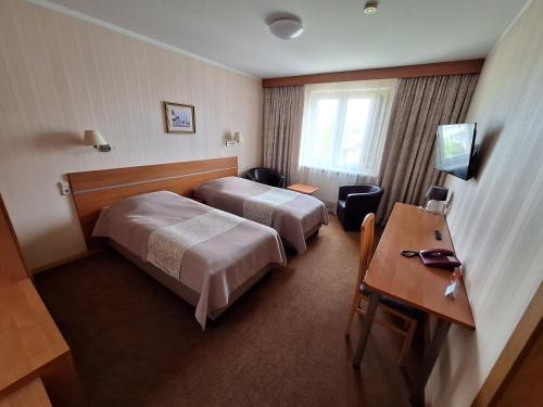Postel nebo postele na pokoji v ubytování Home B&B