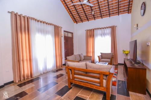 Posezení v ubytování Rivershore Villas
