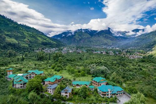 an aerial view of a resort in the mountains at Storii By ITC Hotels Urvashis Retreat, Manali in Manāli