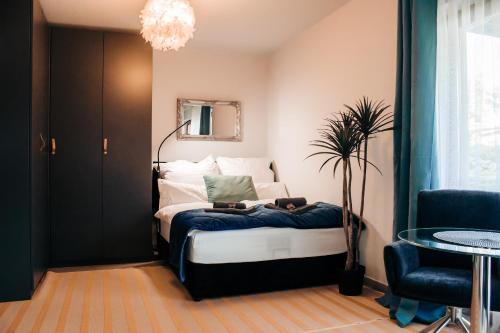 Postel nebo postele na pokoji v ubytování Sunnybelle Appartements Medingen