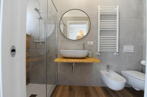 Un baño de L'ulivo D'oro