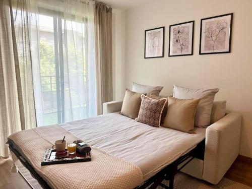 Postel nebo postele na pokoji v ubytování Suite Alya Appartement proche Disneyland