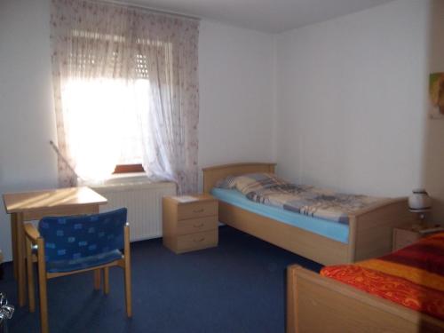 Postel nebo postele na pokoji v ubytování Monteur Gästehaus Mönchengladbach