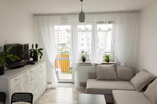 Ruang duduk di Apartament Symfonia