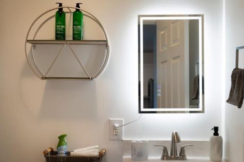 a bathroom with a sink and a mirror at Delightful Getaway near Acadia Park Bar Harbor (5) in Trenton