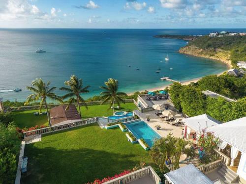 an aerial view of a house and the ocean at Culturally Luxurious Villa- ViewFort Estate in Ebenezer