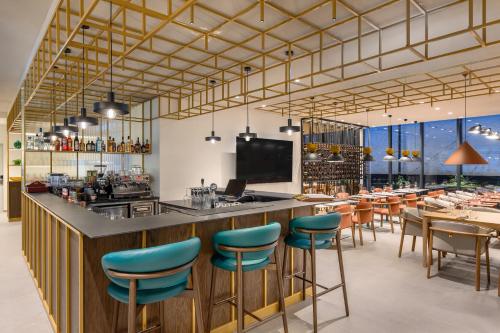 Телевизор и/или развлекательный центр в Hilton Garden Inn Debrecen City Center