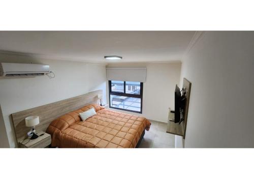 Ένα ή περισσότερα κρεβάτια σε δωμάτιο στο Miralejos Apart Triplex