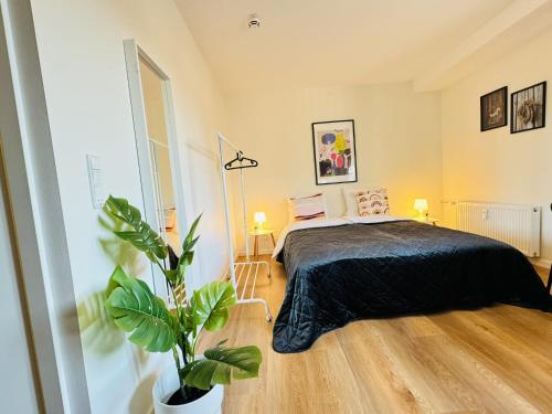 Ένα ή περισσότερα κρεβάτια σε δωμάτιο στο aday - Cozy and Modern Studio Apartment