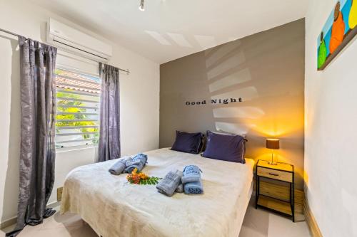Llit o llits en una habitació de Villa Noukasa