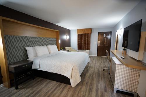 Cama o camas de una habitación en Columbus Inn and Suites