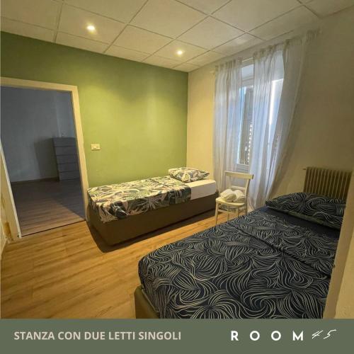 Una cama o camas en una habitación de Room45 appartamento in centro a Gradisca