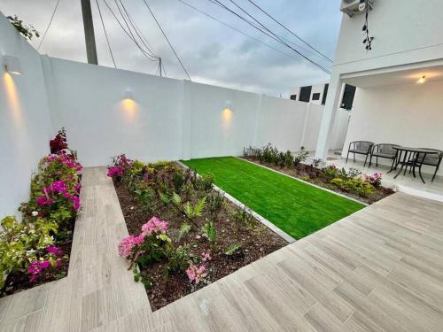Zahrada ubytování Casa en Data Playas Village