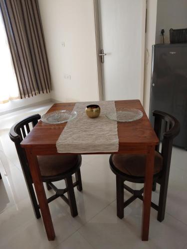 Телевизор и/или развлекательный центр в Lovely 1BHK High end Amenities, near Dabolim Apartment
