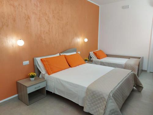 Postel nebo postele na pokoji v ubytování B&B - Over the top - Affittacamere