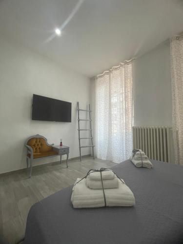 Postel nebo postele na pokoji v ubytování La casa nel viale