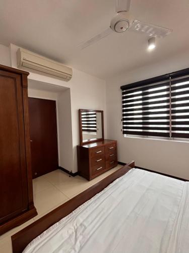 Katil atau katil-katil dalam bilik di Colombo On320 Union place
