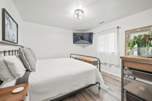 En eller flere senge i et værelse på Bear Creek Cottage