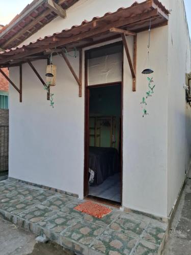 a view of the outside of a house with a window at Beach in Cabedelo