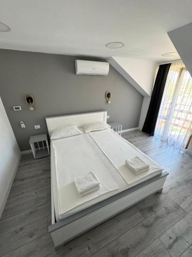 Postel nebo postele na pokoji v ubytování Casa Presecan