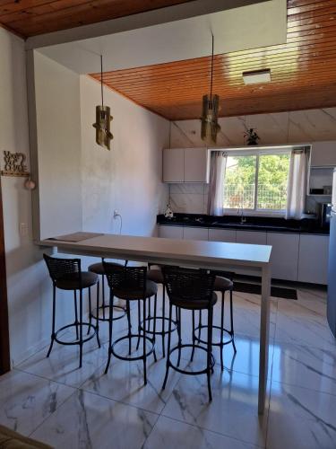 Dapur atau dapur kecil di Residencial Refúgio