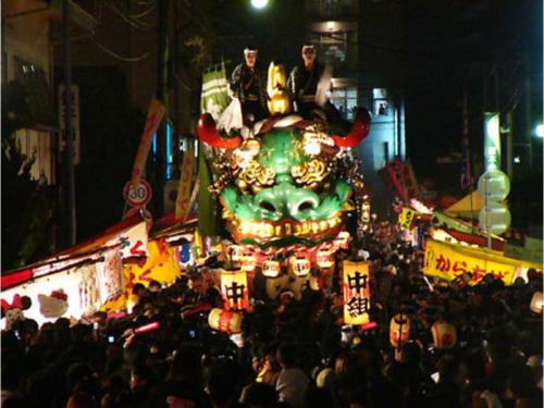 a large crowd of people watching a parade with a large elephant at Asuka Hotel - Vacation STAY 59965v in Karatsu