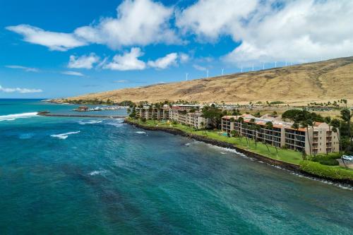 an aerial view of a resort on the beach at Remodeled 3 Bedroom Oceanfront Condo — Sleeps 8 in Wailuku