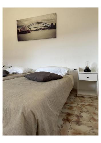 Ένα ή περισσότερα κρεβάτια σε δωμάτιο στο Apartamento Fortaleza