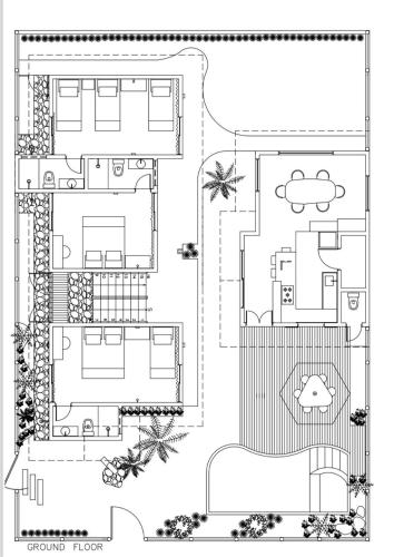 a floor plan of a house at Teça Suites in Guriú