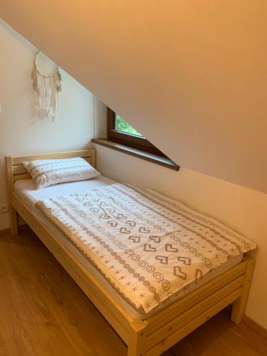 Ένα ή περισσότερα κρεβάτια σε δωμάτιο στο YASNA Apartments