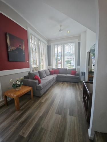 a living room with a couch and a table at THE CARRICK in Bisbee