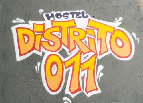 a drawing of the word messy on a wall at Hostel Distrito 011 in Sao Paulo
