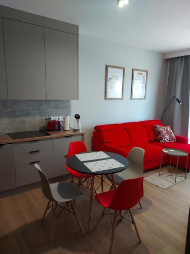 Η κουζίνα ή μικρή κουζίνα στο Baltic Loft Apartament
