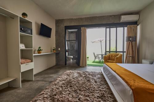 Postel nebo postele na pokoji v ubytování Aura Hotel B&B
