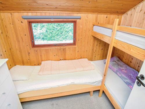 Postel nebo postele na pokoji v ubytování 5 person holiday home in Jægerspris-By Traum