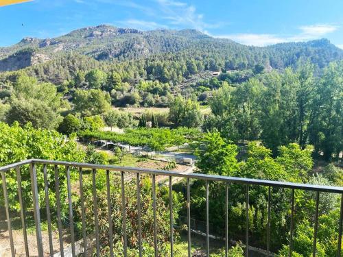 a view of a mountain from a balcony at Dúplex en Montanejos 200 metros del río Mijares in Montanejos