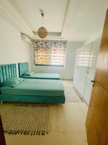 Postel nebo postele na pokoji v ubytování Appartement la falaise