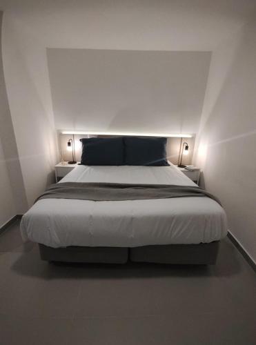 Postel nebo postele na pokoji v ubytování Recoleta Suites