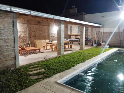 Πισίνα στο ή κοντά στο Casa Quinta en Paso de La Patria Corrientres Argentina